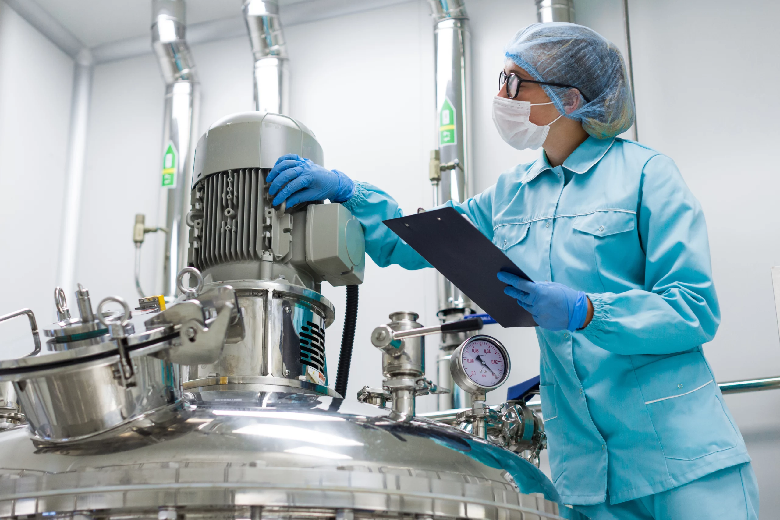 woman reviews audit plan in factory